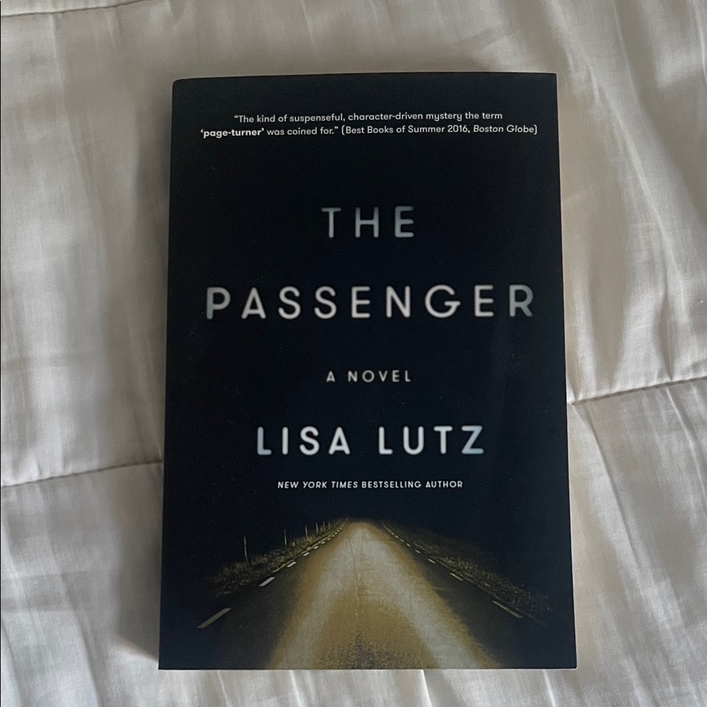 The Passenger by Lisa Lutz - Black Cover